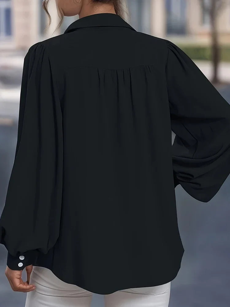 Nora’s | Elegant Peplum Blouse