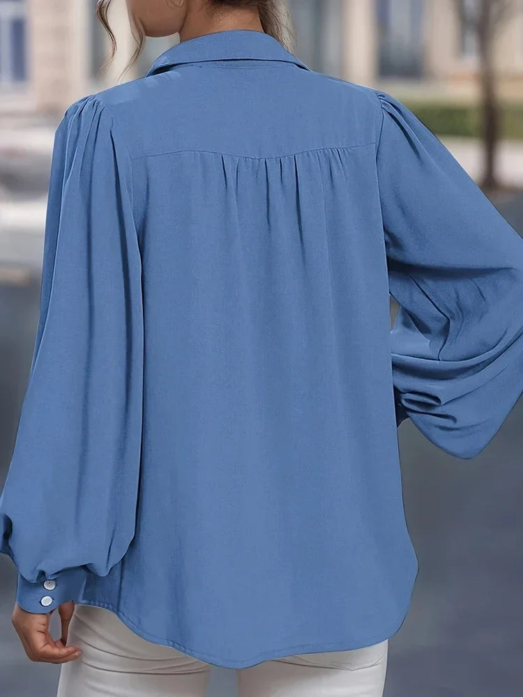 Nora’s | Elegant Peplum Blouse